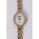 Longines, a ladies 9ct yellow gold cocktail wristwatch, integral bracelet, oval cream dial with