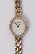 Longines, a ladies 9ct yellow gold cocktail wristwatch, integral bracelet, oval cream dial with