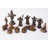 A collection of brass/bronze Asian figures (13).