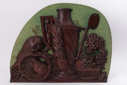 An unusual oak carving possibly Flemish 19th century depicting nested birds, swags, flowers and