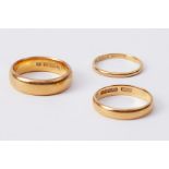 Three 22ct yellow gold wedding bands, total weight 15.30gm, (3).