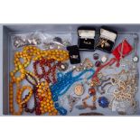 An interesting large selection of costume jewellery & some silver items including beads, faux