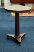 A 19th century rosewood pedestal wine table, diameter 53cm.