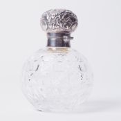 A silver and glass scent bottle with stopper, height 12cm.
