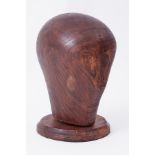 A milliners hat block on stand, height 27cm.