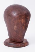 A milliners hat block on stand, height 27cm.