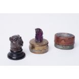A small bulldog novelty inkwell, 5cm together with a amethyst coloured glass circular box mounted