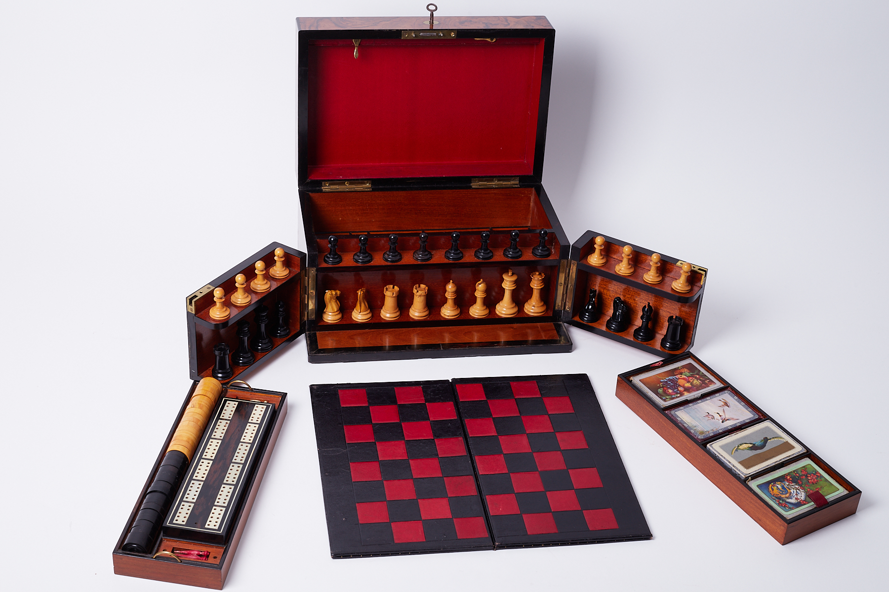 A Victorian Royal Cabinet of Games, in figured walnut case, the hinged lid enclosing an interior - Image 4 of 5