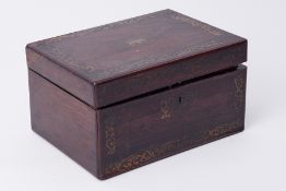 A 19th century rosewood and brass inlaid travel box fitted with an arrangement of jars and metal