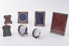 A collection of seven various silver photo frames.