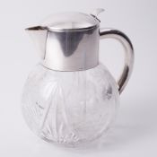 A 1930's silver plated and glass lemonade jug, height 23cm.