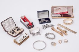 An interesting mixed lot including a boxed set of silver cufflinks & shirt studs, a heavy gauge ring