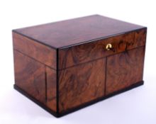 A Victorian Royal Cabinet of Games, in figured walnut case, the hinged lid enclosing an interior