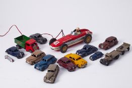 A Japanese tinplate Indianapolis racing car together with various old Dinky Toys and also a Minic