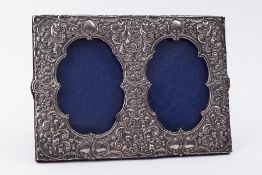 A double silver photo frame, Birmingham 1902 by William Devonport 20cm x 29cm.