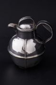 A silver plated cream jug in form of a Guernsey jug, height 15cm.