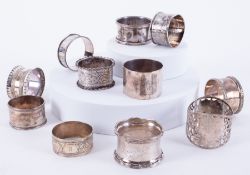 A mixed collection of eleven silver and other serviette rings (three non silver), approx 6.03oz.