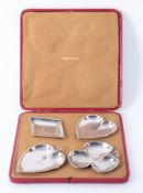A cased set of four silver dishes, in the form of the four suits of playing cards, Birmingham