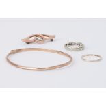 A mixed lot to include a 9ct yellow gold bangle, 2.65gm, a 9ct yellow gold band, 0.85gm, a 9ct