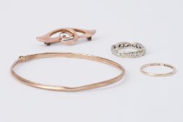 A mixed lot to include a 9ct yellow gold bangle, 2.65gm, a 9ct yellow gold band, 0.85gm, a 9ct