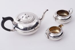 A Geo V three piece silver tea service, circa 1931, approx 19.86oz (teapot lacks finial).