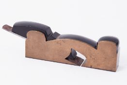 A bronze and ebony wood working plane, length of base 20cm, unmarked.