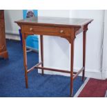 Edwardian mahogany and cross bounded writing table fitted with a single drawer, 77cm wide.