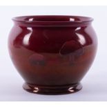 A William Moorcroft Claremont vase under a rich Ruby lustre glaze, circa 1907, height 9cm,