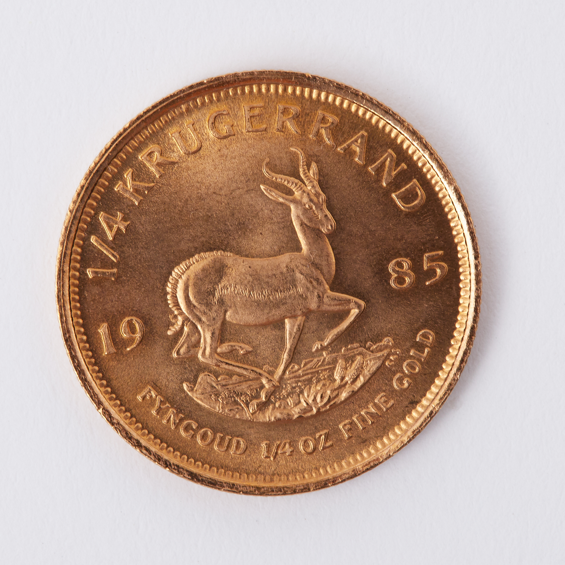 A quarter ounce Krugerrand gold coin 1985.