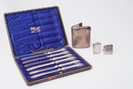 A cased set of silver handled butter knives together with two silver vesta's and a cigarette case,