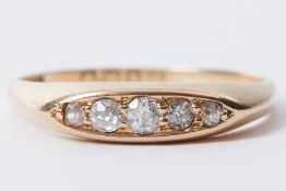An 18ct yellow gold five stone ring set with old round cut diamonds, approx. 0.14 carats, 2.45g,