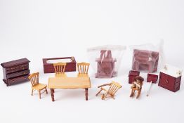 A collection of dolls house furniture.
