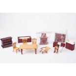 A collection of dolls house furniture.