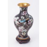 A 20th century Chinese oriental cloisonne vase and stand, height 35cm.
