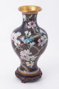 A 20th century Chinese oriental cloisonne vase and stand, height 35cm.
