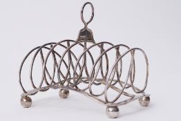 A Geo III silver six division and wire work toast rack, circa 1827, approx 10.53oz, maker possibly T
