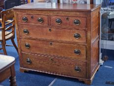 A 19th century oak chest of drawers, fitted with two short and three long drawers, width 113cm, .