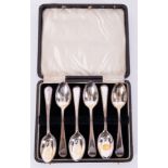 A cased set of six silver teaspoons Old English with bead pattern..