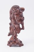 A carved Chinese hardwood figure of a fisherman, height 34cm (faults),