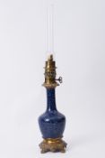 A blue bottle vase converted to a table lamp,(electric), possibly Chinese, height excluding funnel