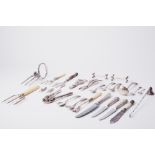 A mixed collection of silver plated cutlery and objects.