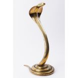 A heavy and large ornamental brass Snake, height 51cm.