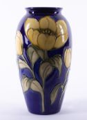 A Moorcroft vase decorated with yellow tulips, No.41/50 edition, height 25cm.