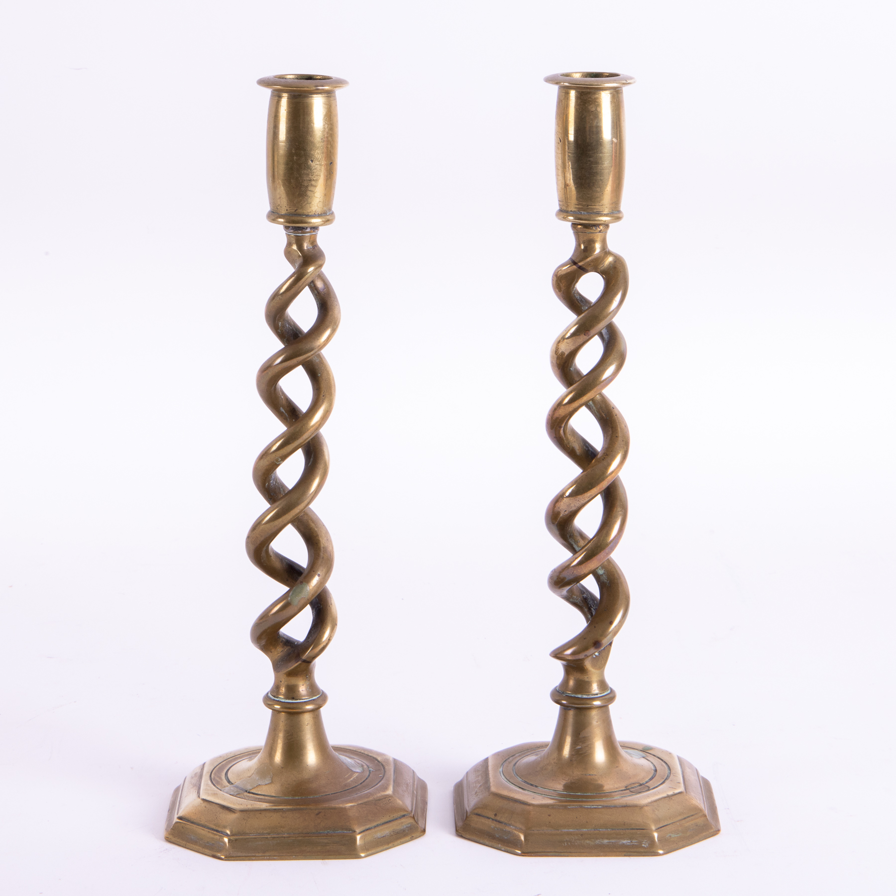 A pair of antique brass open twist candlesticks, height 31cm.