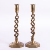 A pair of antique brass open twist candlesticks, height 31cm.