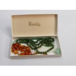 A collection of ladies costume jewellery: including Amber bracelet & earrings etc