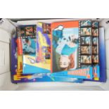 A mixed collection of Thunderbirds items to include: Photograph Albums, Jotters, Fact File, Poster