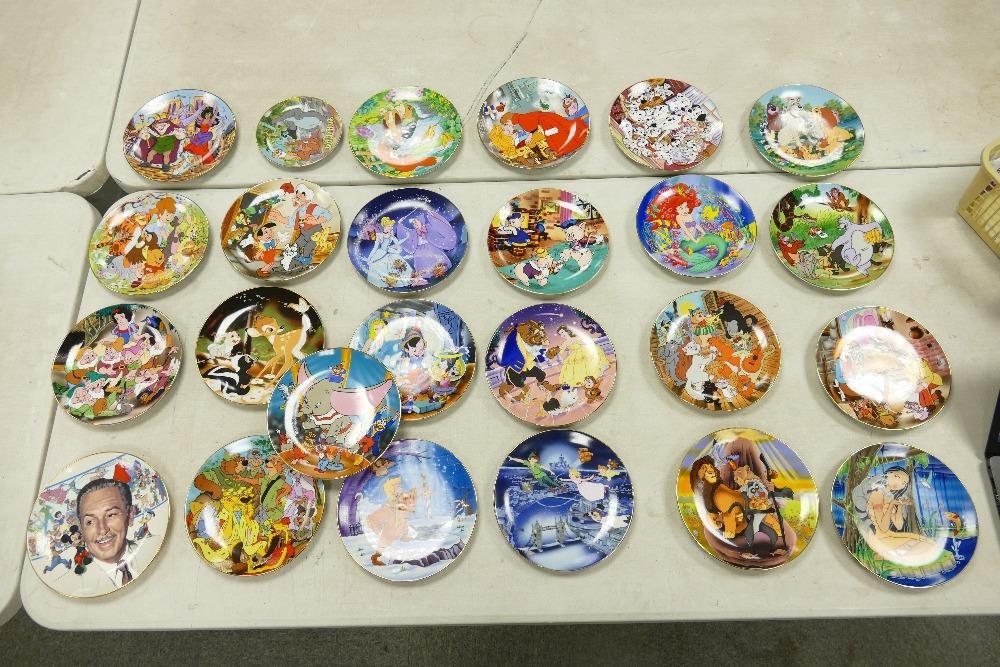 A large collection of Disney Theme Collectible Plates: