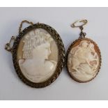 Antique large oval cameo brooch: together with a smaller yellow metal oval cameo brooch. (2)