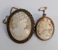 Antique large oval cameo brooch: together with a smaller yellow metal oval cameo brooch. (2)
